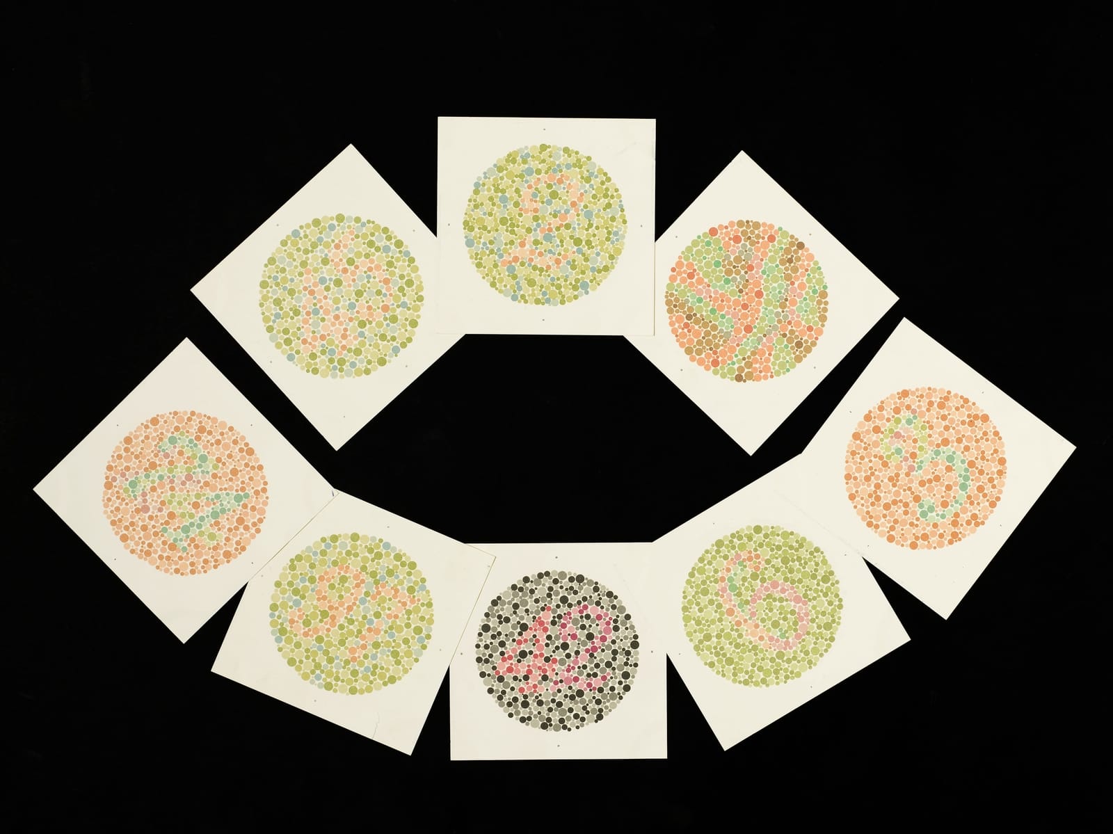 Eight Ishihara charts for testing colour blindness.